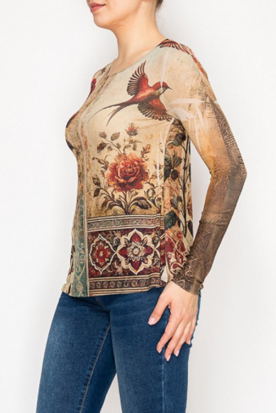 Person wearing a patterned top and blue jeans on a white background