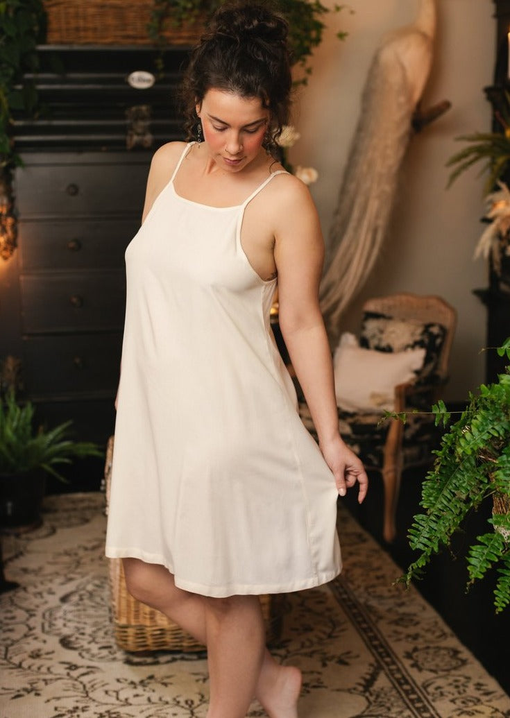 Side view of model wearing Etoile Simple Slip.