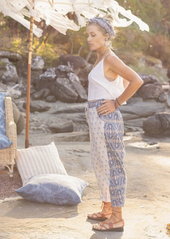 Side view of model wearing Head in the Clouds Artist Pant.