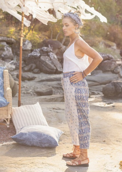 Side view of model wearing Head in the Clouds Artist Pant.