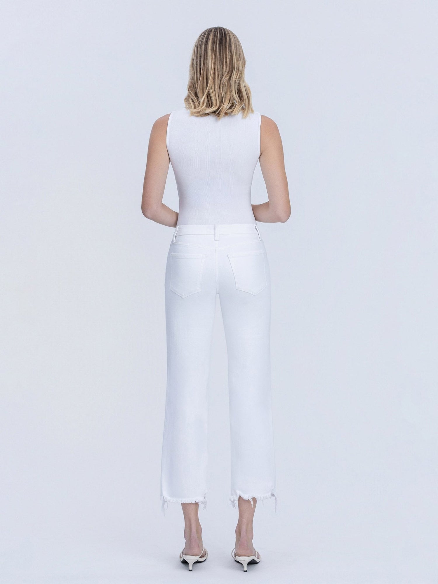 Mid Rise Uneven Hem Crop Jeans - Vintage Vault Boutique