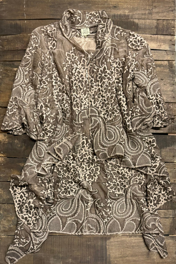 Lace Kimono on a wooden surface