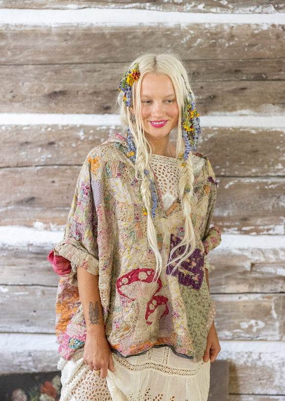 Model wearing Patchwork Dune Hoodie in Laurel Canyon color, front view showing mushroom applique.