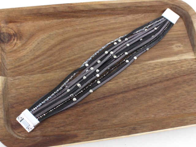 Multistrand beaded bracelet on a wooden surface