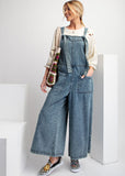 Front view of model wearing wide leg stone washed denim jumpsuit.