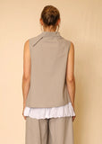Back view of Esme Vest on a model, showing the asymmetric collar detail.