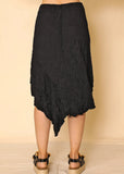 Back view of Nina crinkle knit skirt on a model.