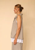 Side view of the Esme Vest on a model.