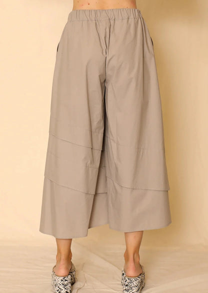 Back view of Maddy pant on model, showing back elastic waist.