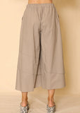 Back view of Maddy pant on model, showing back elastic waist.